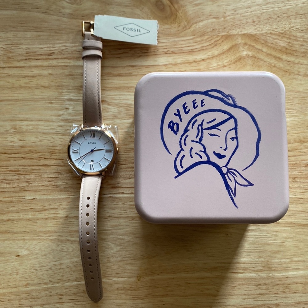 Rose Gold Fossil watch.